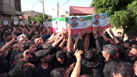 تدفین پیکر مطهر دو پاسدار شهید در روستای فردو قم